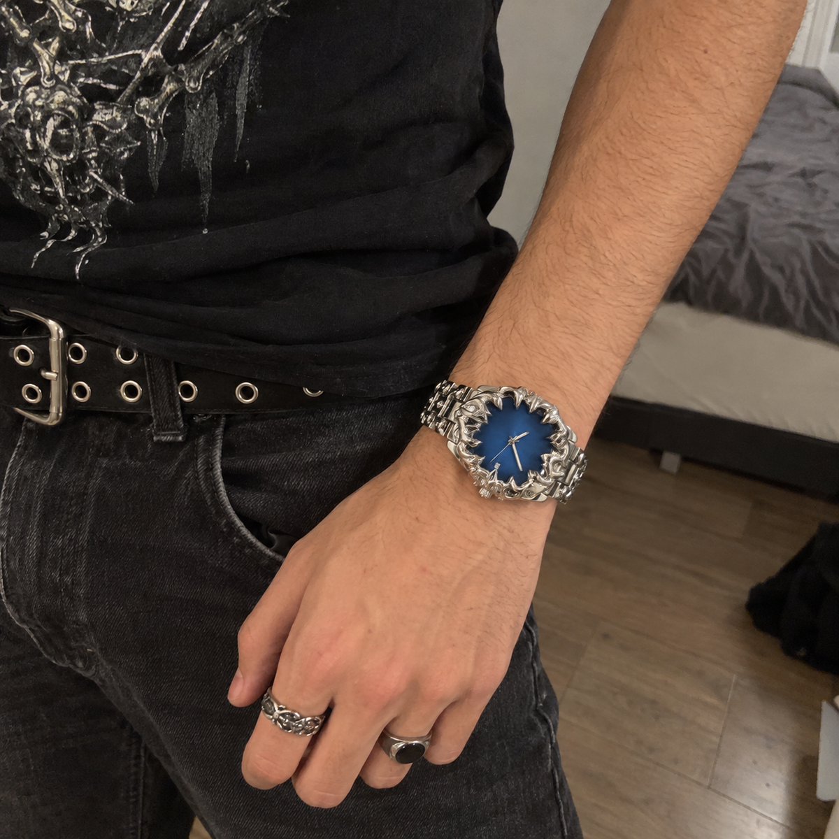 Silver watch with a pale blue dial