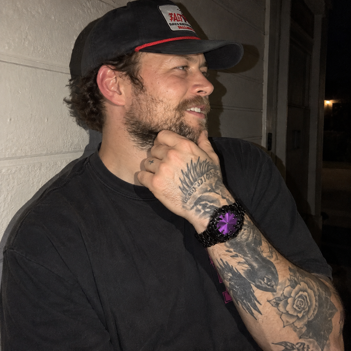 Silver watch worn on the wrist
