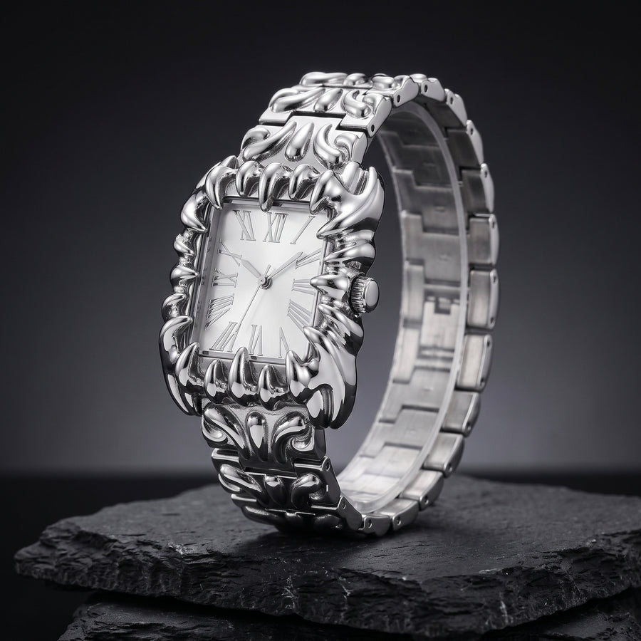 Silver claw watch with a white dial