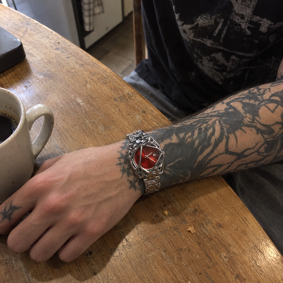 Silver gothic cage-frame watch